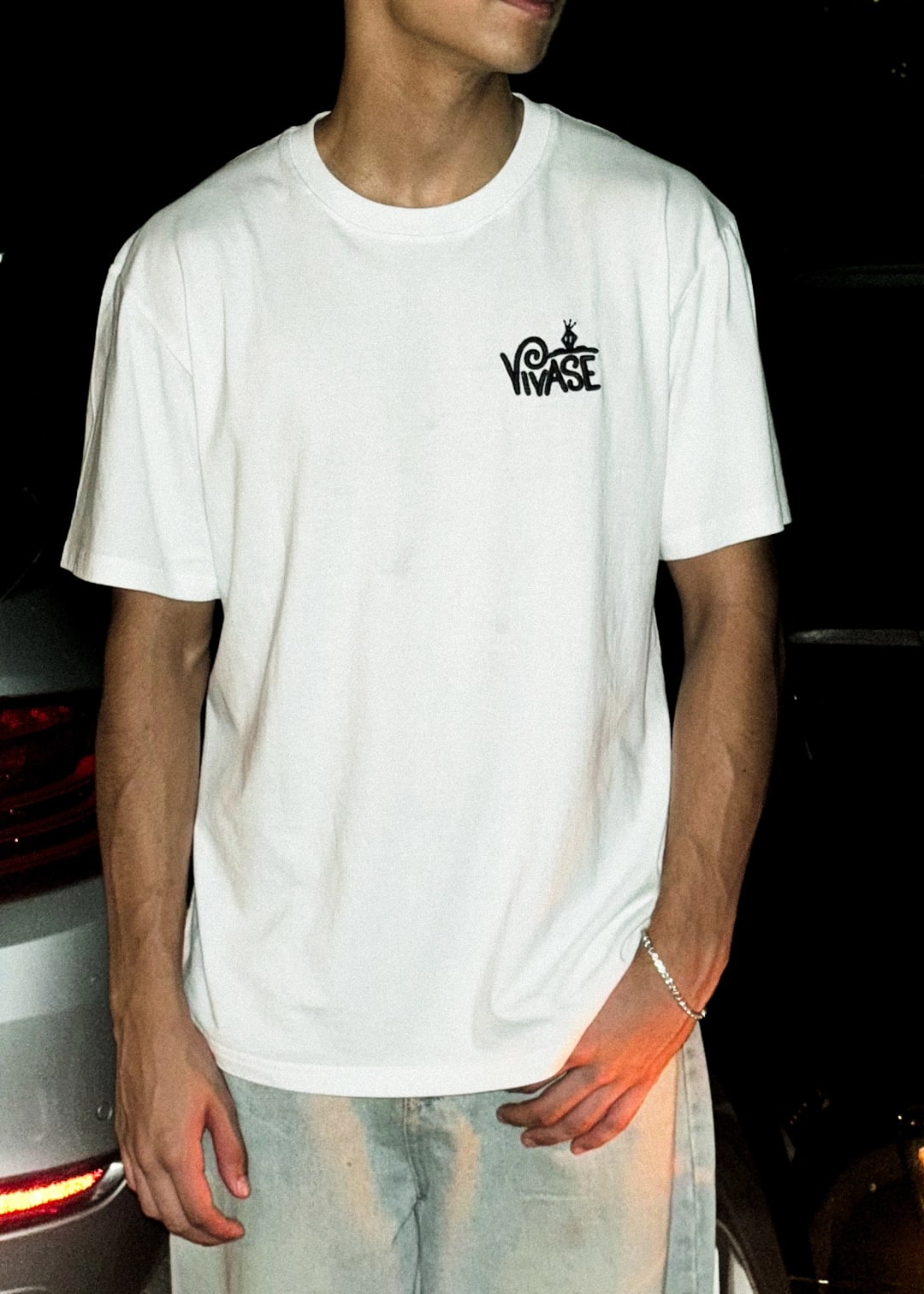 Nyvoria T-Shirt laid flat, with its measurements marked